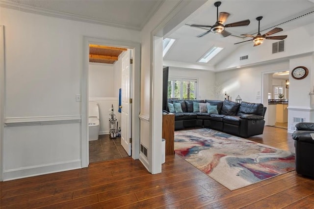 263 Mountainview Cir, Canton, GA 30115 - living area featuring a ceiling fan, wood-type flooring, lofted ceiling, crown molding, and a skylight