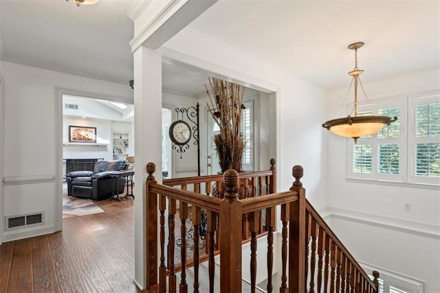 263 Mountainview Cir, Canton, GA 30115 - hall with an upstairs landing, wood-type flooring, and crown molding