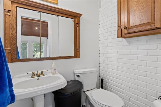 263 Mountainview Cir, Canton, GA 30115 - bathroom with toilet and brick wall