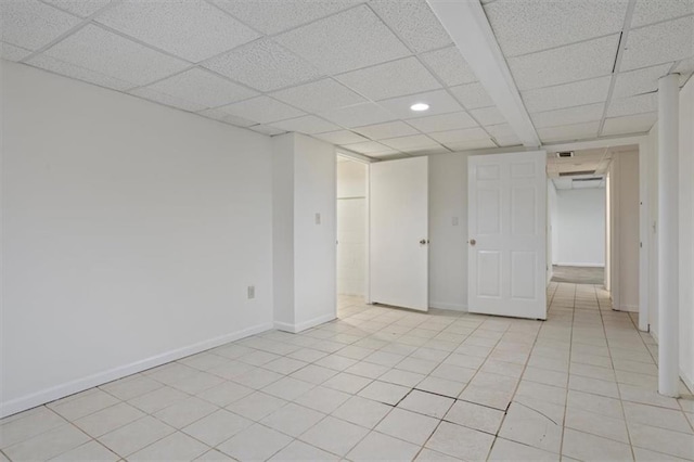 263 Mountainview Cir, Canton, GA 30115 - unfurnished bedroom featuring light tile patterned flooring, a paneled ceiling, and recessed lighting
