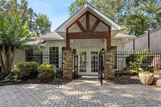 263 Mountainview Cir, Canton, GA 30115 - doorway to property with french doors, stone siding, a standing seam roof, and a metal roof