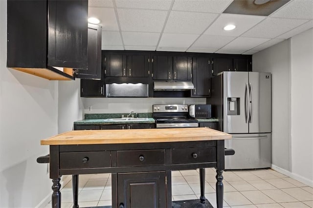 263 Mountainview Cir, Canton, GA 30115 - kitchen with appliances with stainless steel finishes, under cabinet range hood, dark cabinetry, wood counters, and a drop ceiling