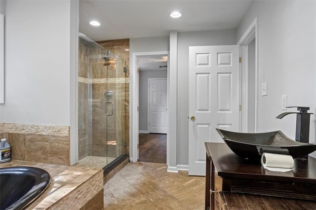 263 Mountainview Cir, Canton, GA 30115 - full bath featuring a shower stall, vanity, a garden tub, and recessed lighting