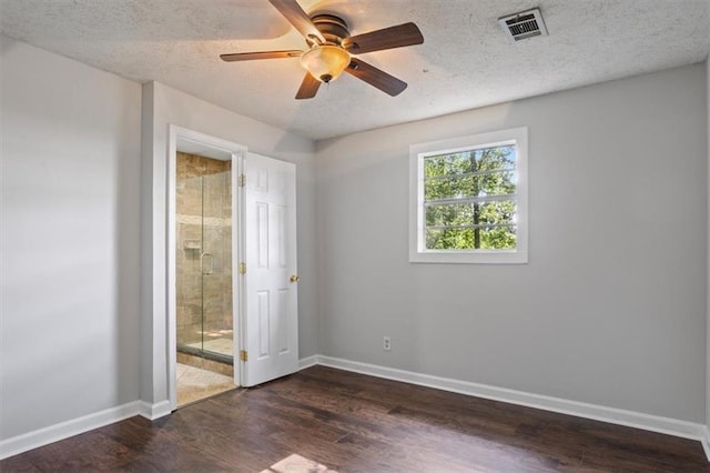 263 Mountainview Cir, Canton, GA 30115 - unfurnished bedroom with wood finished floors, a textured ceiling, ensuite bath, and ceiling fan