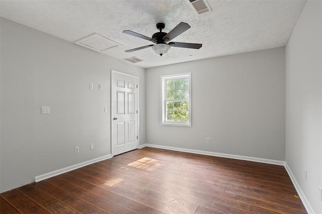 263 Mountainview Cir, Canton, GA 30115 - spare room featuring wood-type flooring, a textured ceiling, ceiling fan, and attic access