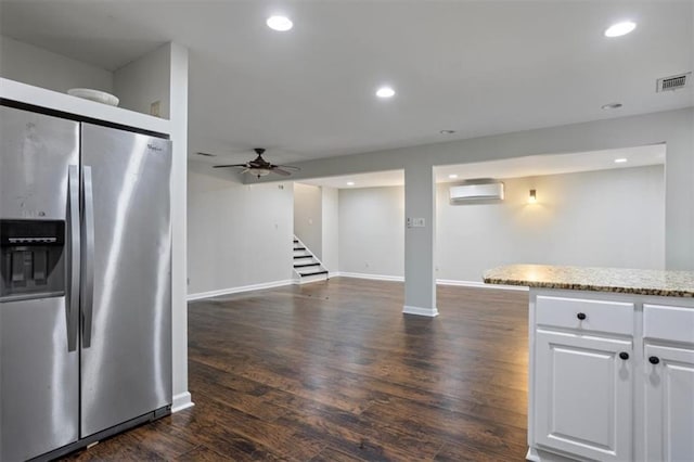 263 Mountainview Cir, Canton, GA 30115 - kitchen with stainless steel fridge, a wall mounted AC, a ceiling fan, dark wood finished floors, and recessed lighting