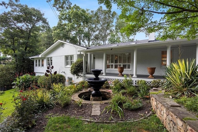 263 Mountainview Cir, Canton, GA 30115 - back of property featuring brick siding, a chimney, and a porch