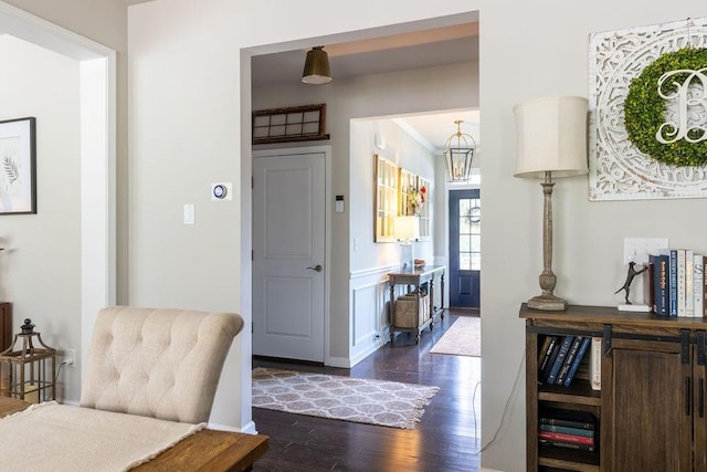 2099 Lakeview Bend Way, Buford, GA 30519 - foyer with dark wood-style floors, crown molding, and a chandelier