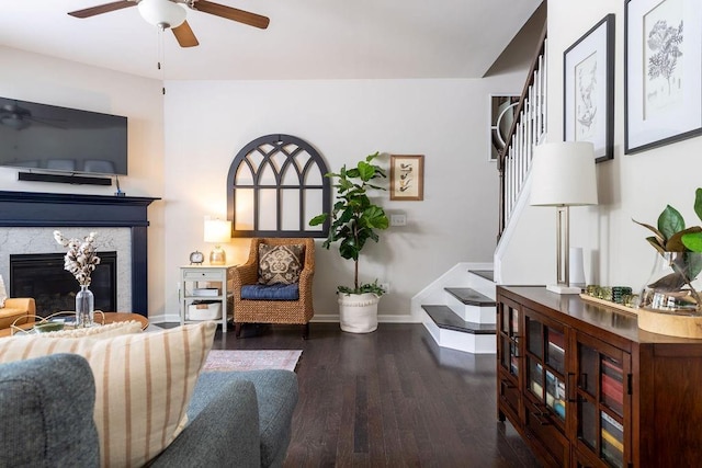 2099 Lakeview Bend Way, Buford, GA 30519 - living area featuring stairs, a ceiling fan, wood finished floors, and a fireplace