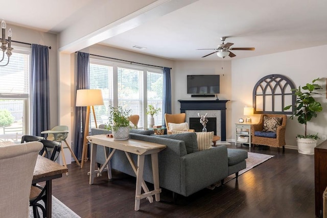 2099 Lakeview Bend Way, Buford, GA 30519 - living area featuring a fireplace, a ceiling fan, and dark wood finished floors