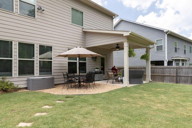 2099 Lakeview Bend Way, Buford, GA 30519 - back of property featuring a ceiling fan and a patio