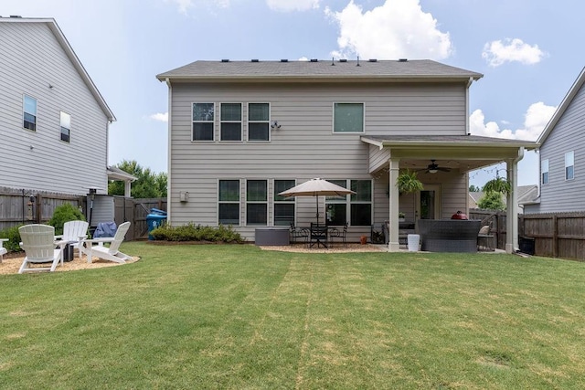 2099 Lakeview Bend Way, Buford, GA 30519 - rear view of house featuring ceiling fan, a fenced backyard, and a patio area