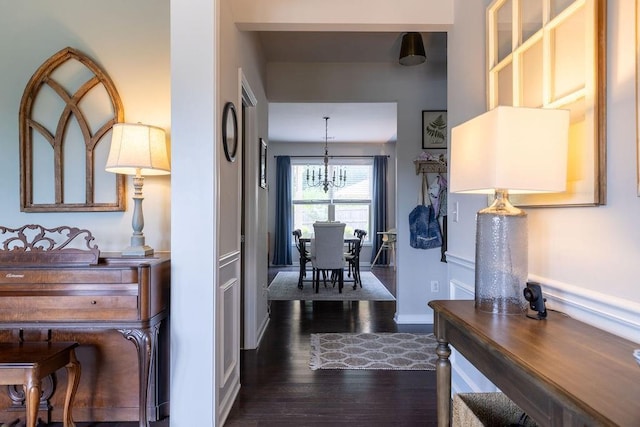 2099 Lakeview Bend Way, Buford, GA 30519 - hallway featuring a chandelier and dark wood finished floors