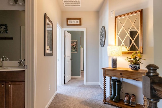 2099 Lakeview Bend Way, Buford, GA 30519 - hall featuring a sink and light carpet