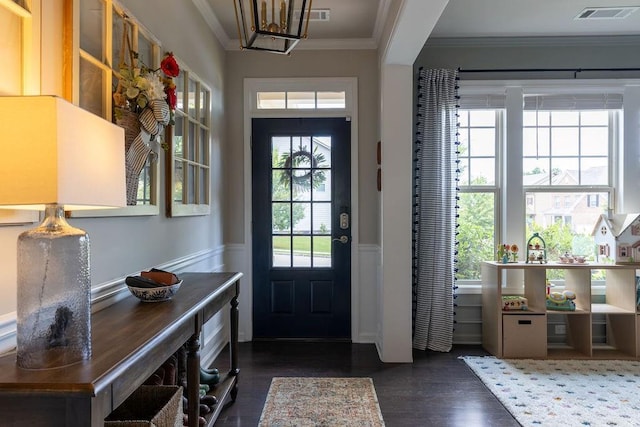 2099 Lakeview Bend Way, Buford, GA 30519 - entrance foyer with dark wood-style floors, ornamental molding, and wainscoting