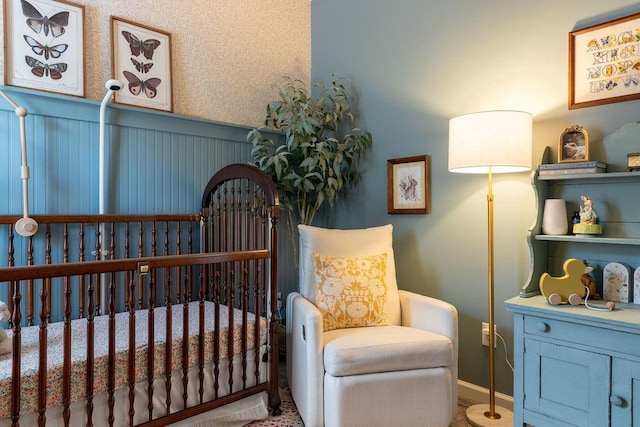 2099 Lakeview Bend Way, Buford, GA 30519 - bedroom with a crib and wainscoting
