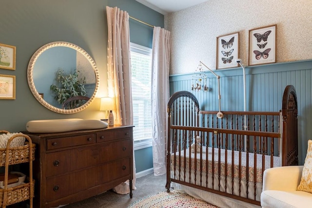 2099 Lakeview Bend Way, Buford, GA 30519 - carpeted bedroom with a crib, wainscoting, and multiple windows