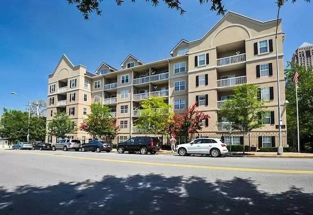 1075 Peachtree Walk Unit A205, Atlanta, GA 30309 - view of apartment building / complex