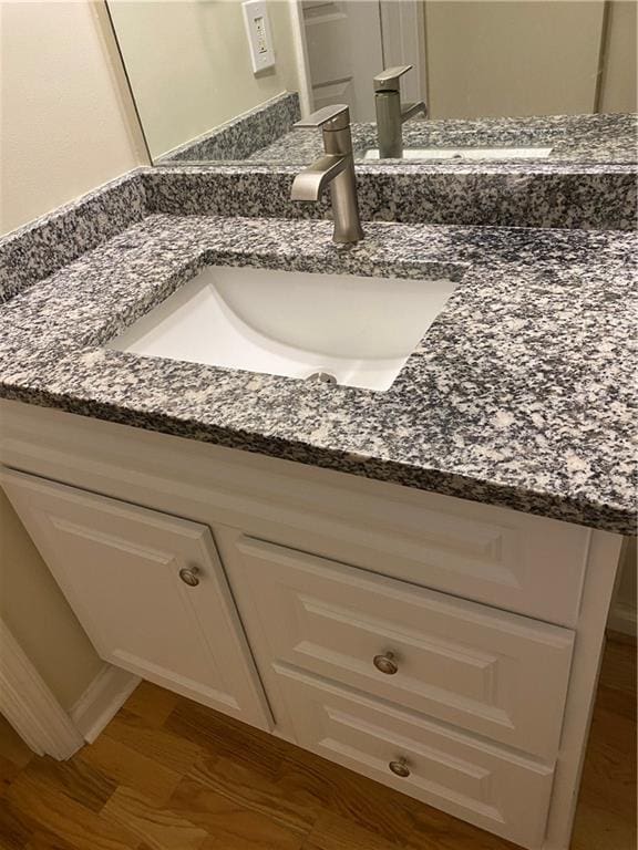 1075 Peachtree Walk Unit A205, Atlanta, GA 30309 - bathroom view of vanity and wood finished floors