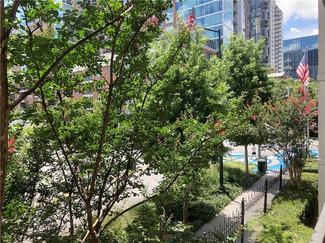 1075 Peachtree Walk Unit A205, Atlanta, GA 30309 - view of community featuring a pool and a city view