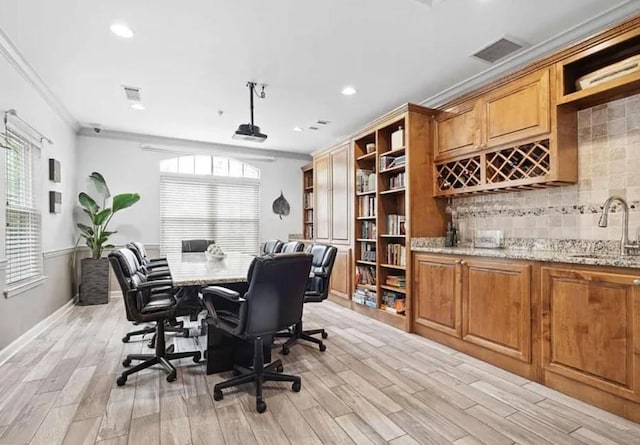 1075 Peachtree Walk Unit A205, Atlanta, GA 30309 - office space featuring a sink, ornamental molding, healthy amount of natural light, light wood-type flooring, and recessed lighting
