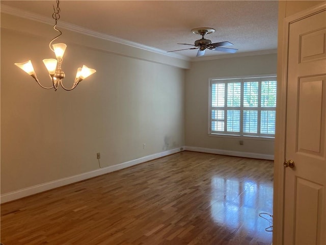 1075 Peachtree Walk Unit A205, Atlanta, GA 30309 - spare room with ornamental molding, a chandelier, wood finished floors, and ceiling fan