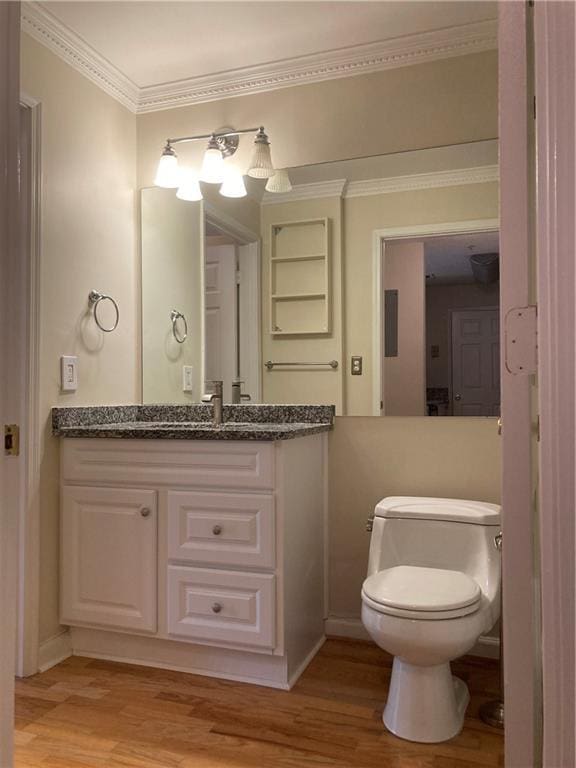 1075 Peachtree Walk Unit A205, Atlanta, GA 30309 - bathroom featuring wood finished floors, vanity, and crown molding