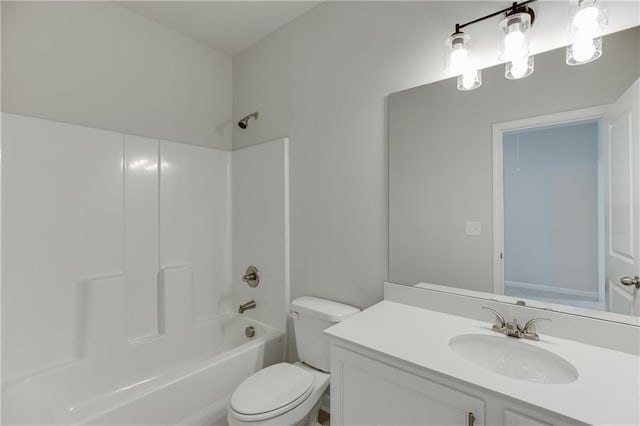 full bathroom with shower / bath combination, vanity, and toilet