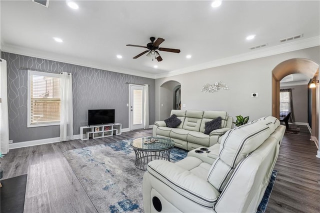 4850 Wilshire Xing, Cumming, GA 30040 - living area featuring arched walkways, baseboards, ornamental molding, a ceiling fan, and wood finished floors