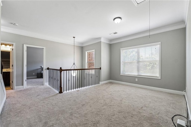 4850 Wilshire Xing, Cumming, GA 30040 - empty room with attic access, ornamental molding, healthy amount of natural light, light carpet, and baseboards