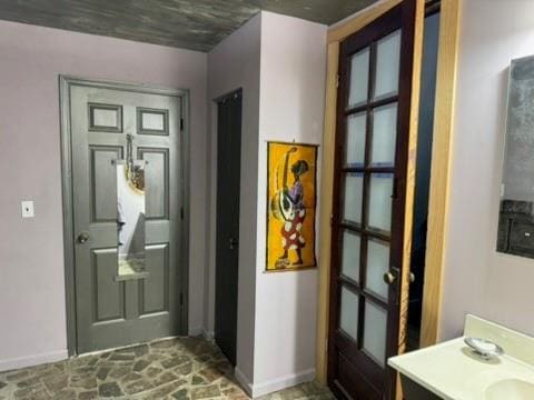 doorway with baseboards