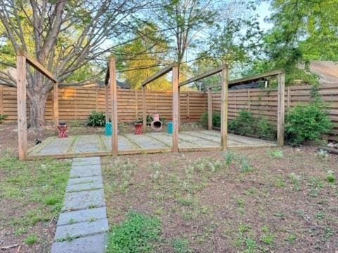 view of yard featuring a fenced backyard