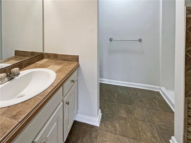 532 Terrapin Ln, Winder, GA 30680 - bathroom featuring vanity and baseboards