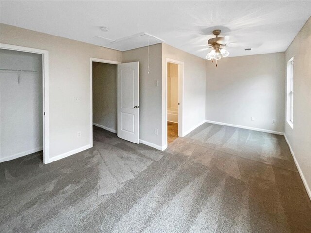 532 Terrapin Ln, Winder, GA 30680 - unfurnished bedroom with attic access, baseboards, and dark carpet