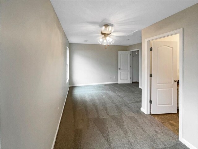 532 Terrapin Ln, Winder, GA 30680 - unfurnished room with dark colored carpet, visible vents, and baseboards