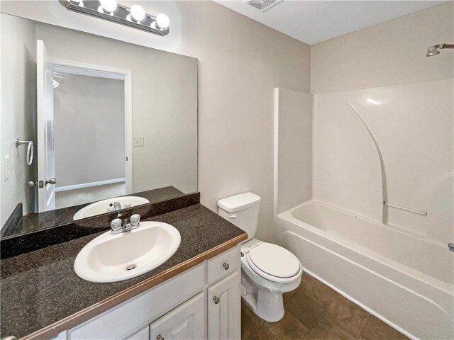 532 Terrapin Ln, Winder, GA 30680 - bathroom featuring shower / washtub combination, vanity, and toilet
