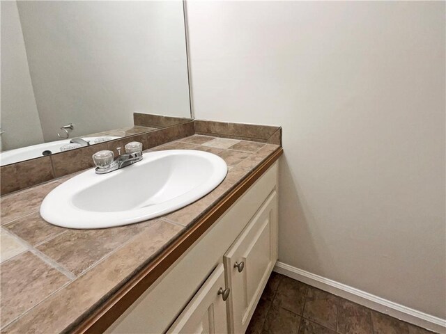 532 Terrapin Ln, Winder, GA 30680 - bathroom featuring baseboards and vanity