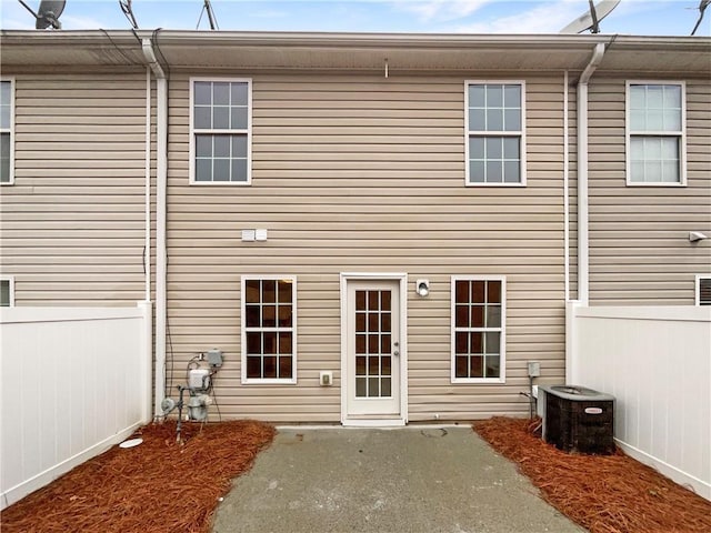 532 Terrapin Ln, Winder, GA 30680 - back of property featuring a patio area, fence, and central AC