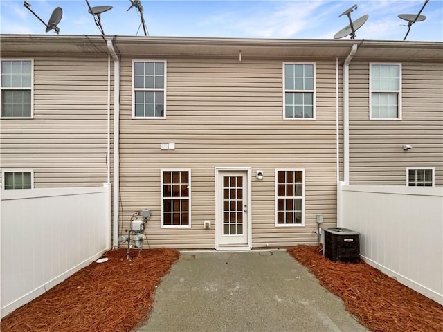 532 Terrapin Ln, Winder, GA 30680 - back of property featuring central AC unit, a patio area, and fence