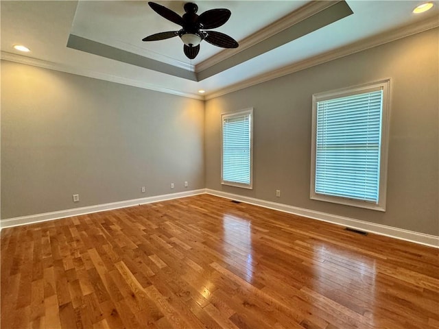 167 Techview Dr SW, Calhoun, GA 30701 - unfurnished room with a raised ceiling, ornamental molding, wood finished floors, a ceiling fan, and baseboards