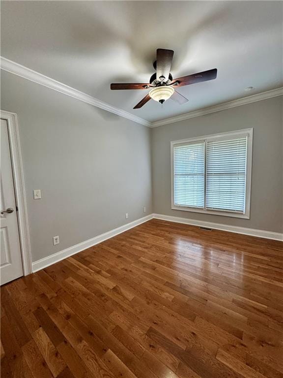 167 Techview Dr SW, Calhoun, GA 30701 - spare room with a ceiling fan, ornamental molding, wood finished floors, and baseboards
