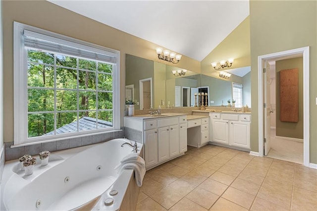 168 Eagle Pointe Dr, Dahlonega, GA 30533 - full bath with double vanity, tile patterned flooring, a whirlpool tub, lofted ceiling, and baseboards