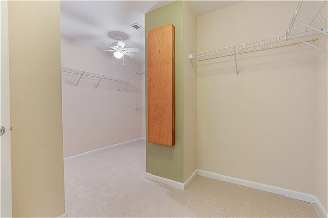168 Eagle Pointe Dr, Dahlonega, GA 30533 - walk in closet with carpet floors and ceiling fan
