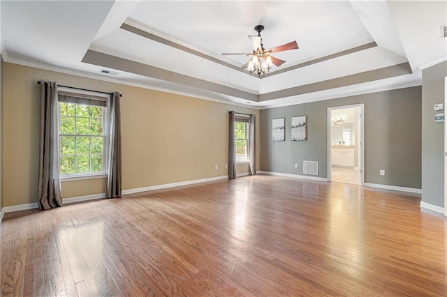 168 Eagle Pointe Dr, Dahlonega, GA 30533 - empty room with a raised ceiling, plenty of natural light, crown molding, and ceiling fan