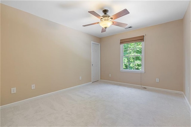 168 Eagle Pointe Dr, Dahlonega, GA 30533 - spare room with light carpet, ceiling fan, and baseboards