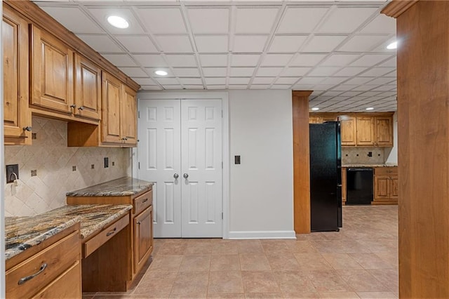 168 Eagle Pointe Dr, Dahlonega, GA 30533 - kitchen featuring black appliances, recessed lighting, stone countertops, decorative backsplash, and brown cabinets