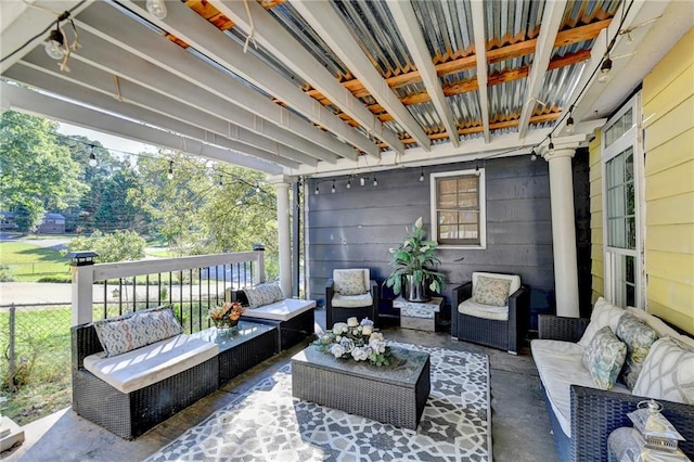 exterior space featuring a patio area and an outdoor hangout area