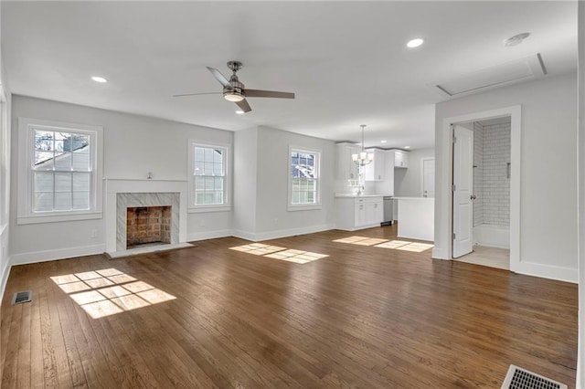 1271 Lorenzo Dr SW, Atlanta, GA 30310 - unfurnished living room featuring baseboards, a high end fireplace, wood finished floors, a ceiling fan, and recessed lighting
