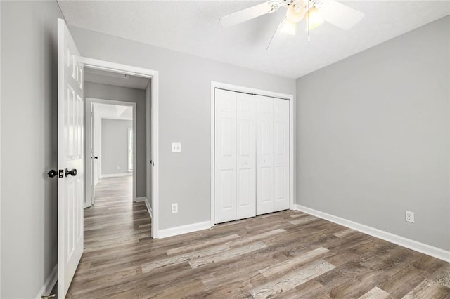 630 River Mill Rd, Bethlehem, GA 30620 - unfurnished bedroom featuring wood finished floors, baseboards, and a closet