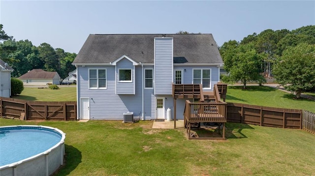 630 River Mill Rd, Bethlehem, GA 30620 - back of house with a chimney, central air condition unit, and a deck